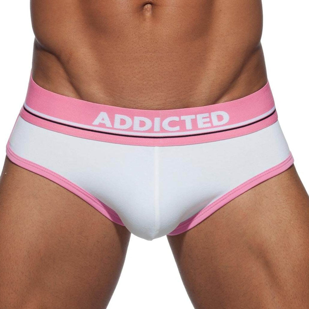 Stylischer Herren Slip in weiß mit rosa Kontrasten  'CURVE BRIEF' aus der Addicted Underwear Kollektion, Frontansicht