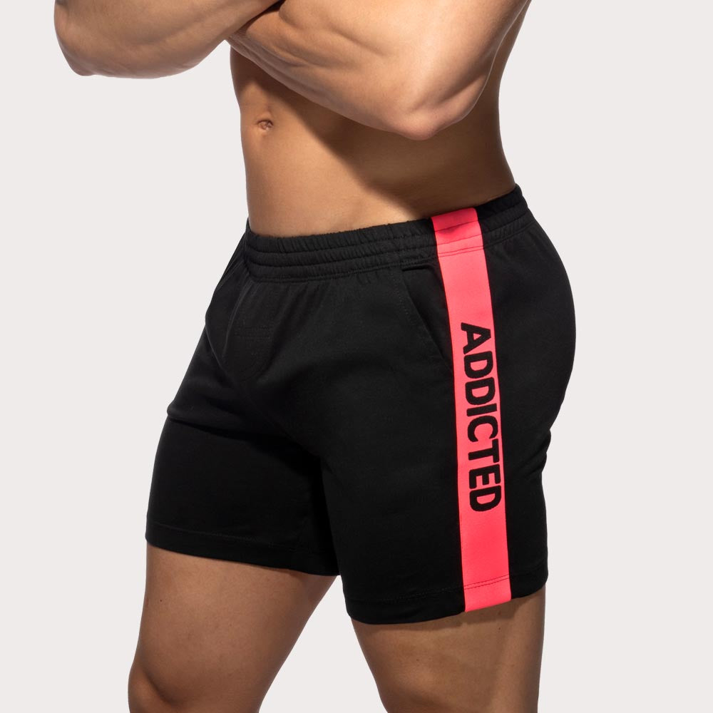 Addicted Band Shorts - Kurze Sporthose aus reiner Baumwolle mit seitlichem Addicted Logo-Band, schwarz