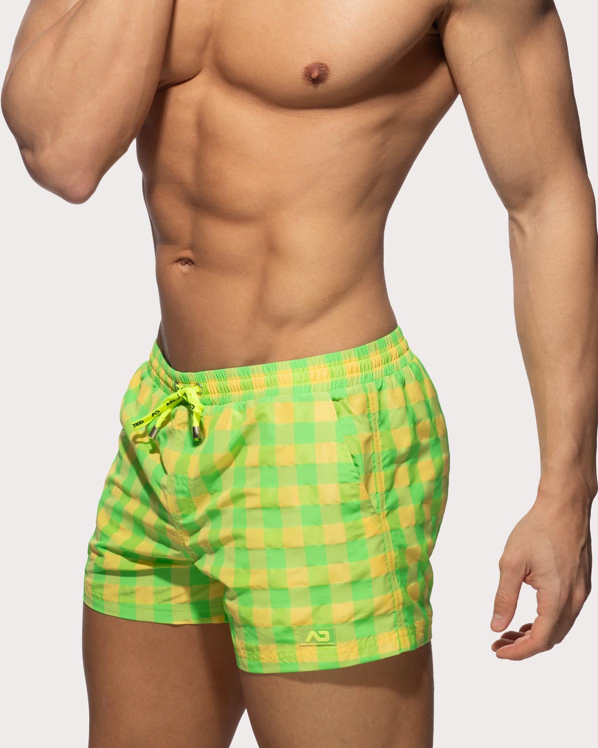 Addicted Flashy Squares Swim Shorts - Sexy Badeshorts für Männer mit Karomuster in neongelb und neongrün, side