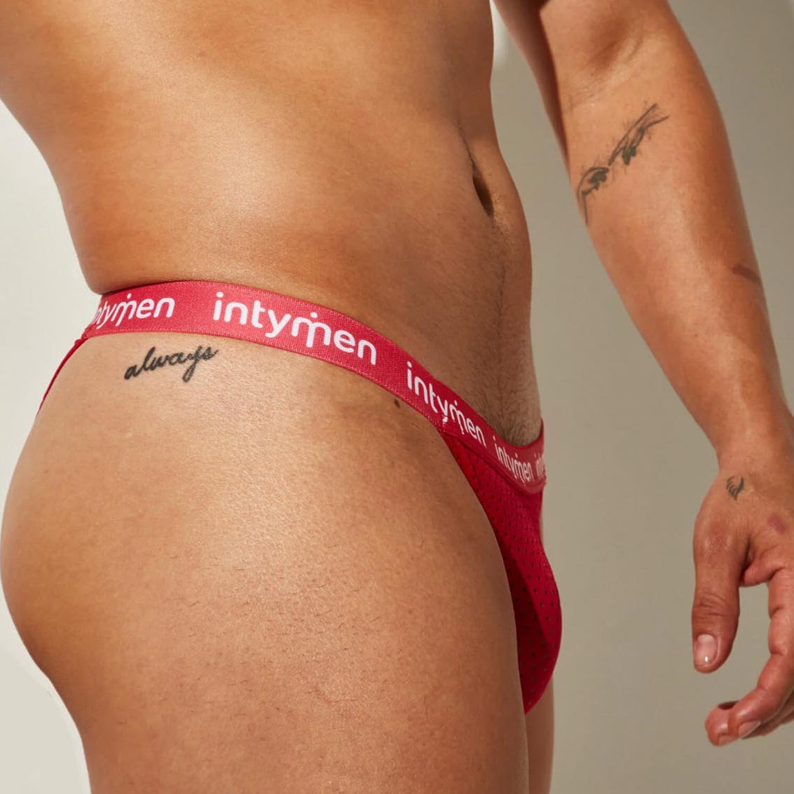 Intymen Love Tanga Brief - roter Mini Slip für Herren im ultra-knappen Tanga Design , side